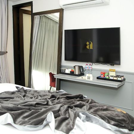 Ambiance Boutique Art Hotel Лахор Номер фото A television in a hotel room
