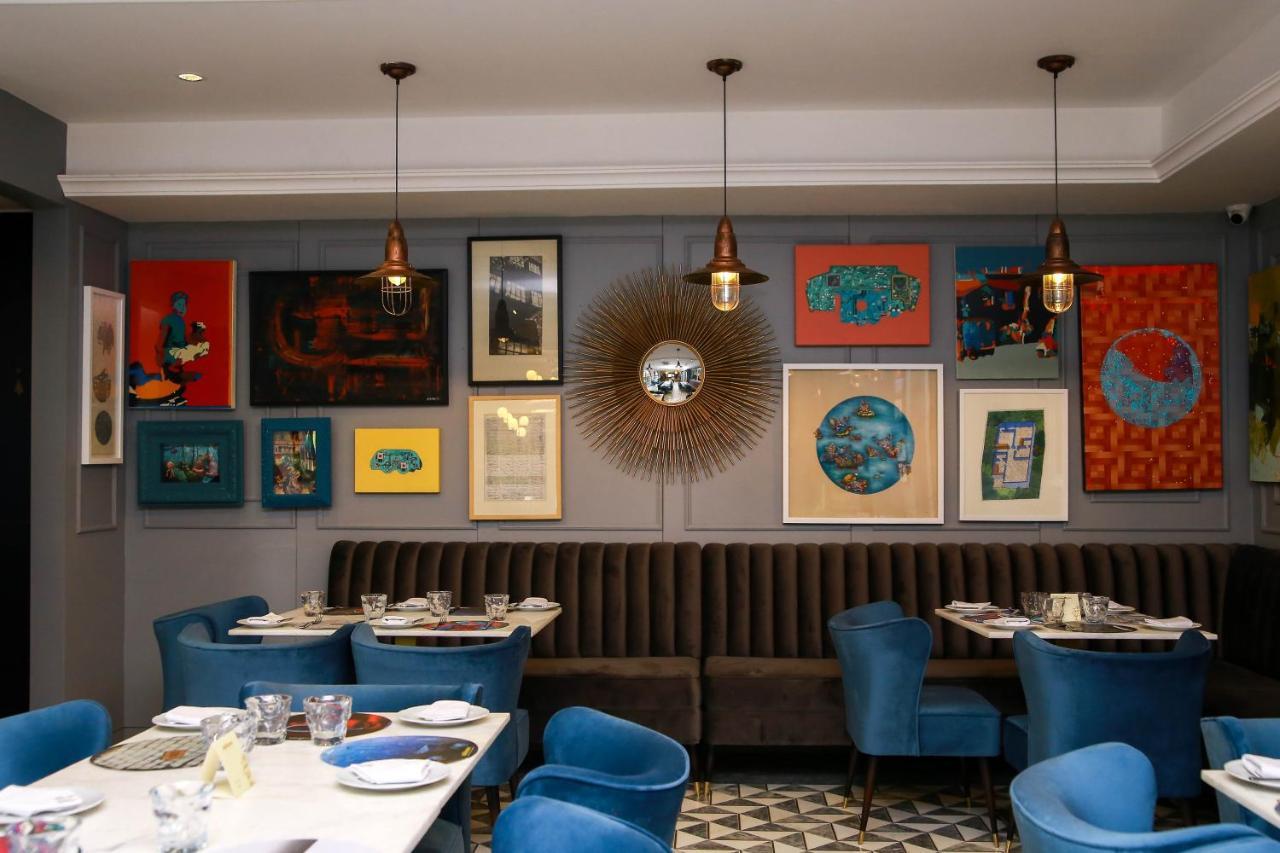 Ambiance Boutique Art Hotel Лахор Экстерьер фото Interior of the restaurant
