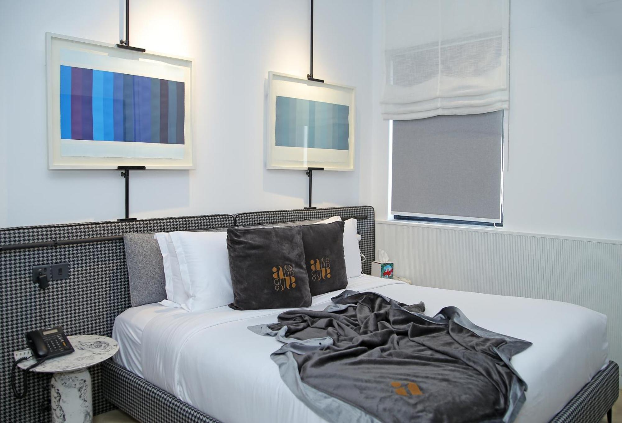 Ambiance Boutique Art Hotel Лахор Номер фото A bedroom at the Standard East Village